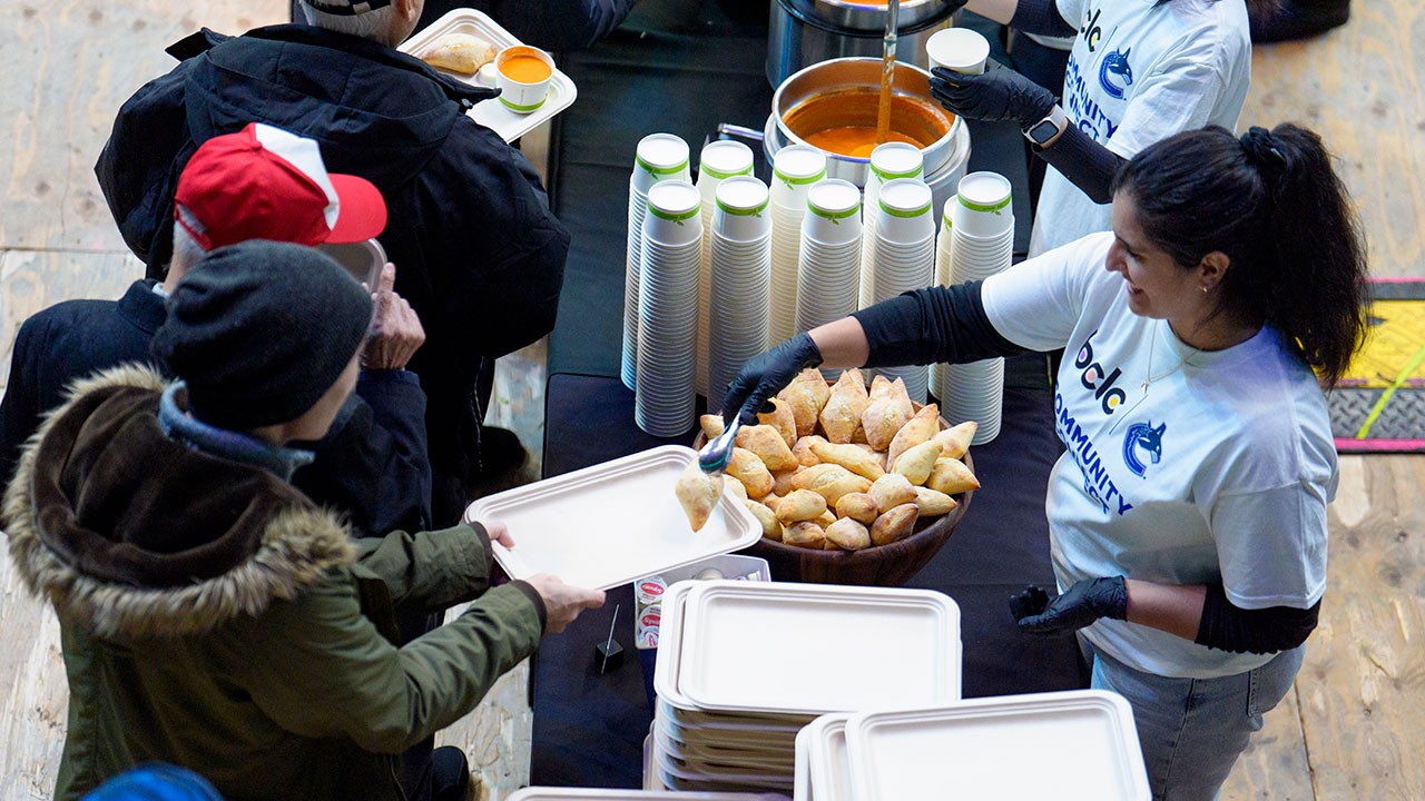 volunteer serving food
