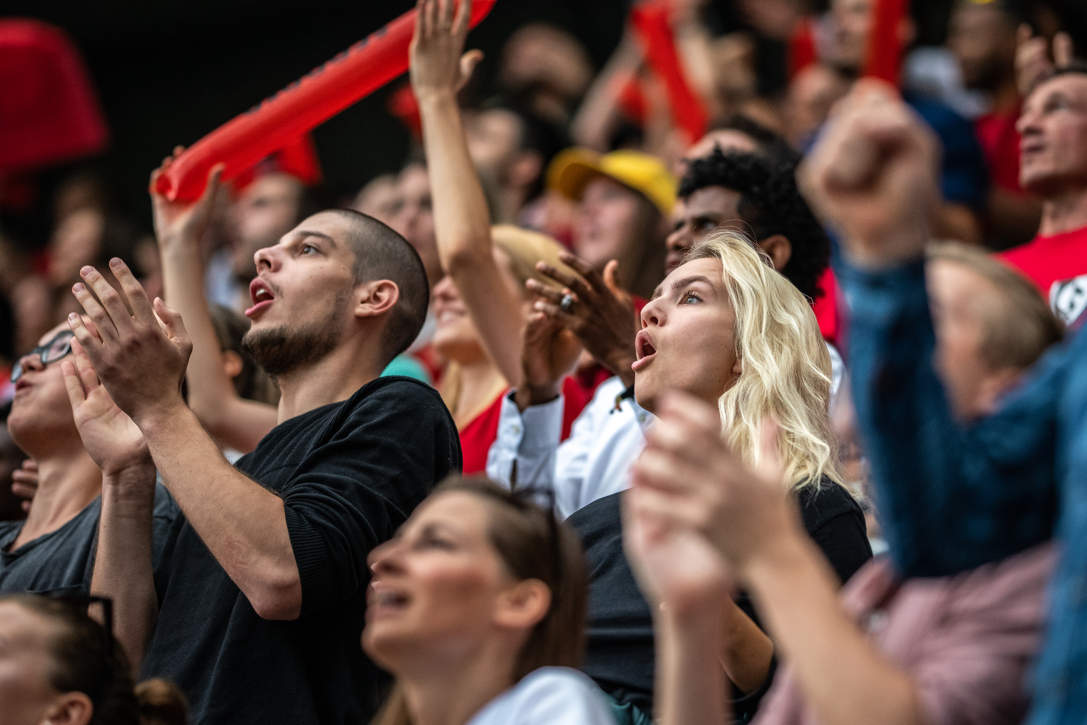 People cheering in the stands