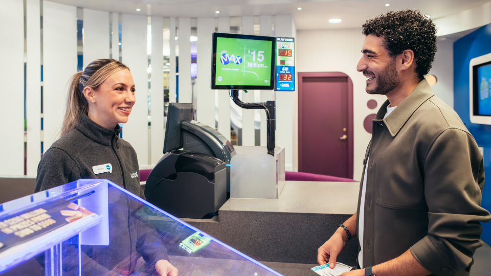 Female worker at lottery retailer.