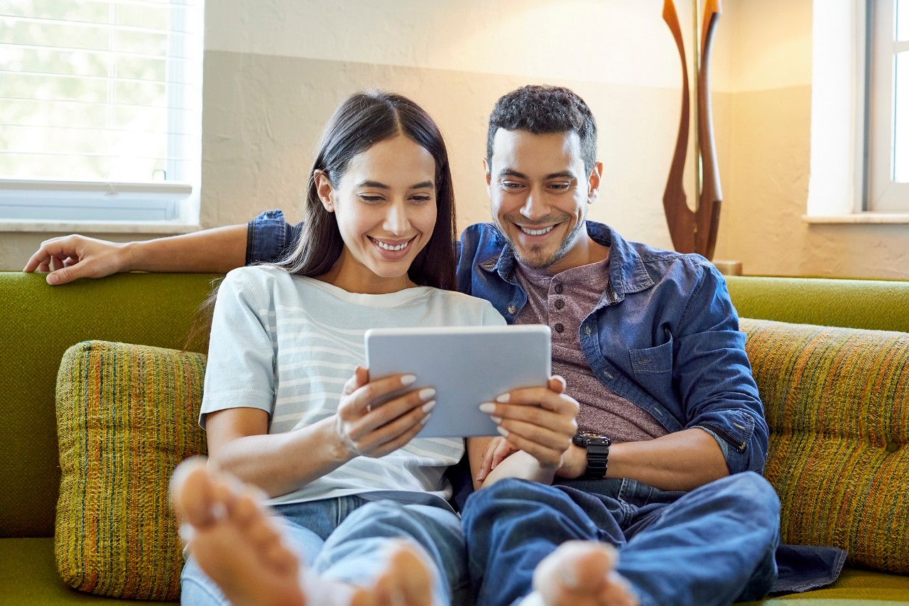 Couple using tablet